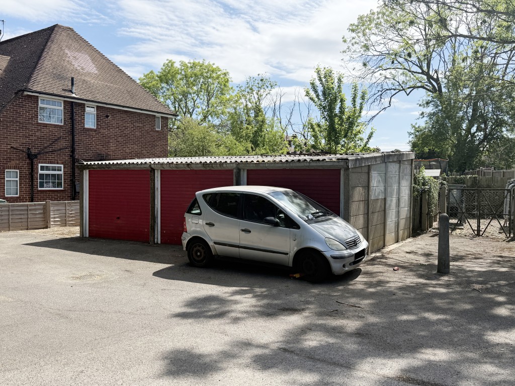 Lot: 13 - ELEVEN GARAGES AND LAND ON CORNER SITE WITH POTENTIAL - Three of eleven garages
